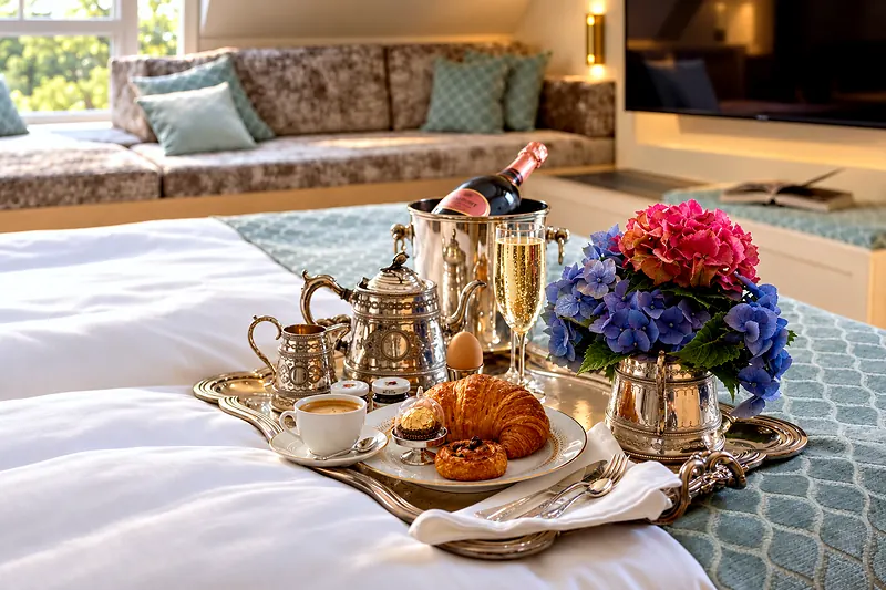 Breakfast in the room, a tray on the bed