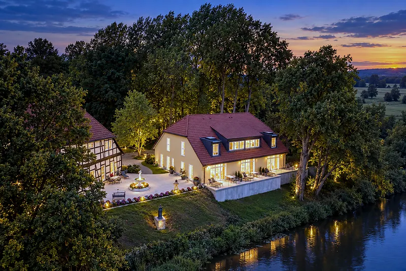 The estate from the air at dusk